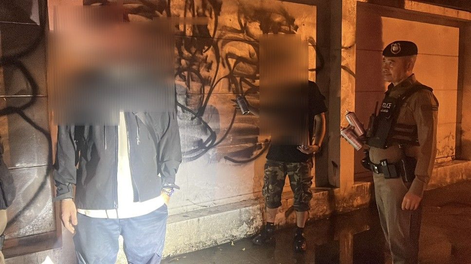 Two Foreigners Arrested for Vandalizing Chiang Mai School Wall
