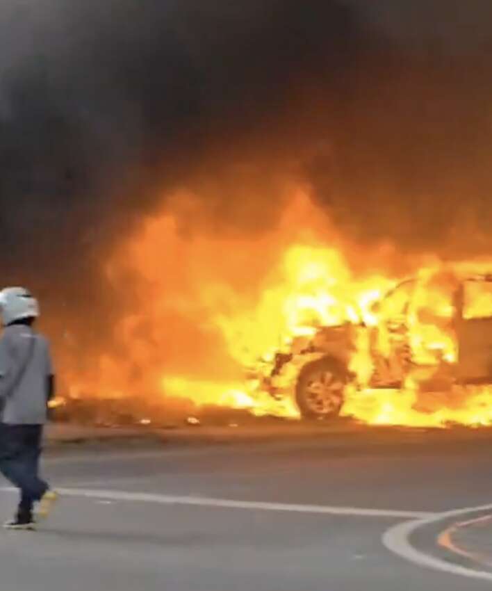 Freight train collides with bus in Bangkok, bus catches fire, at least 6 passengers dead and 10 injured