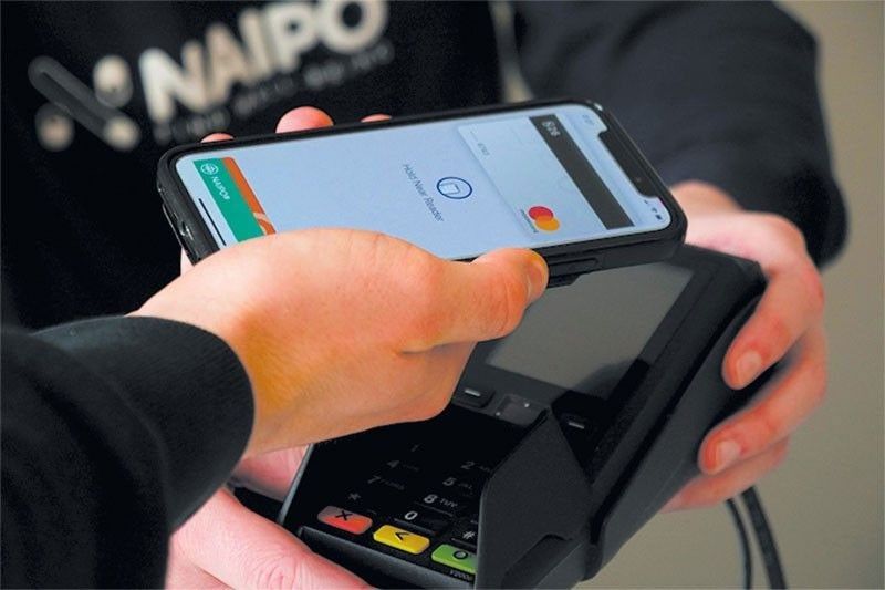 フィリピン、電子ウォレットの手数料維持に攻防 - 金融包摂と事業継続の狭間で