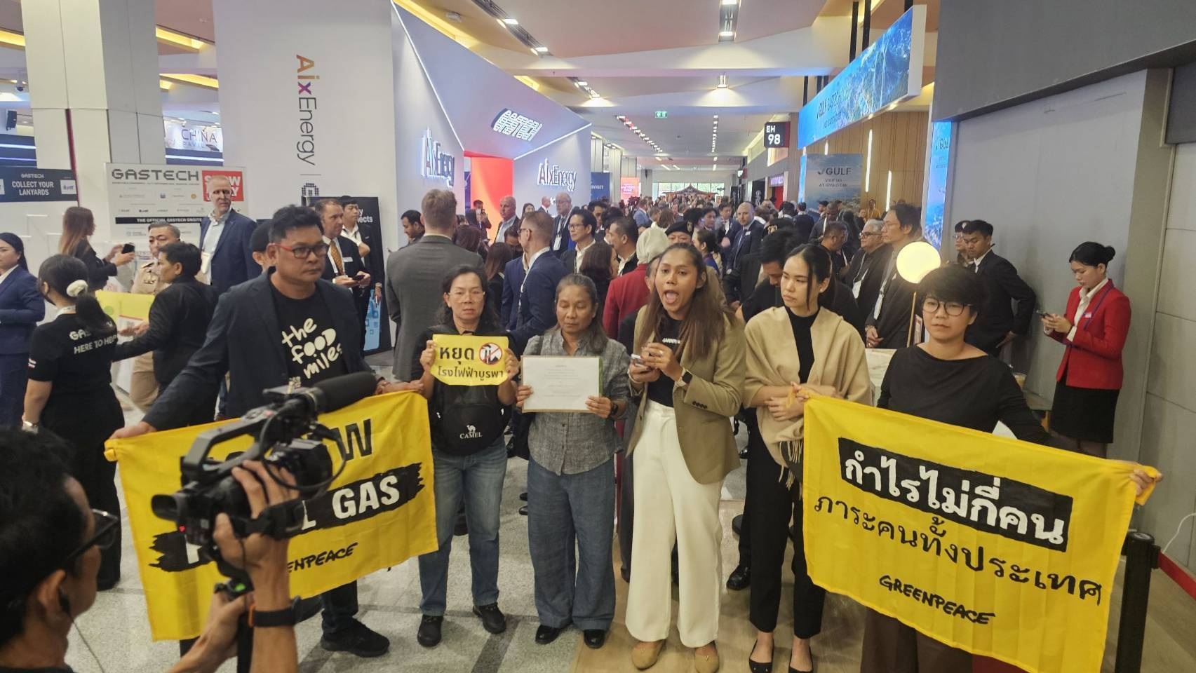 Energy protesters confront PM at Gastech exhibition, demand shift from fossil fuels