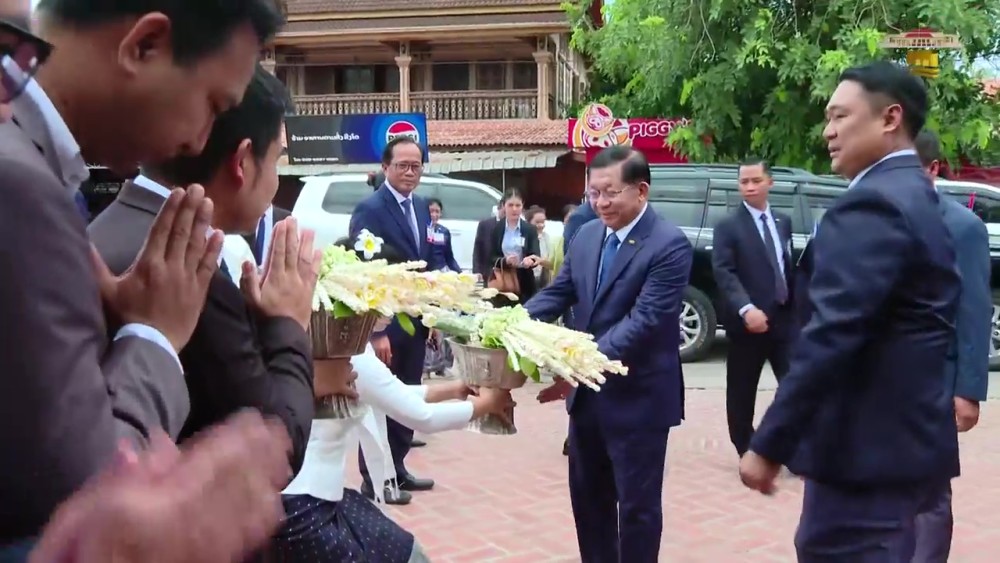 President and wife join Lao traditional Baci Ceremony