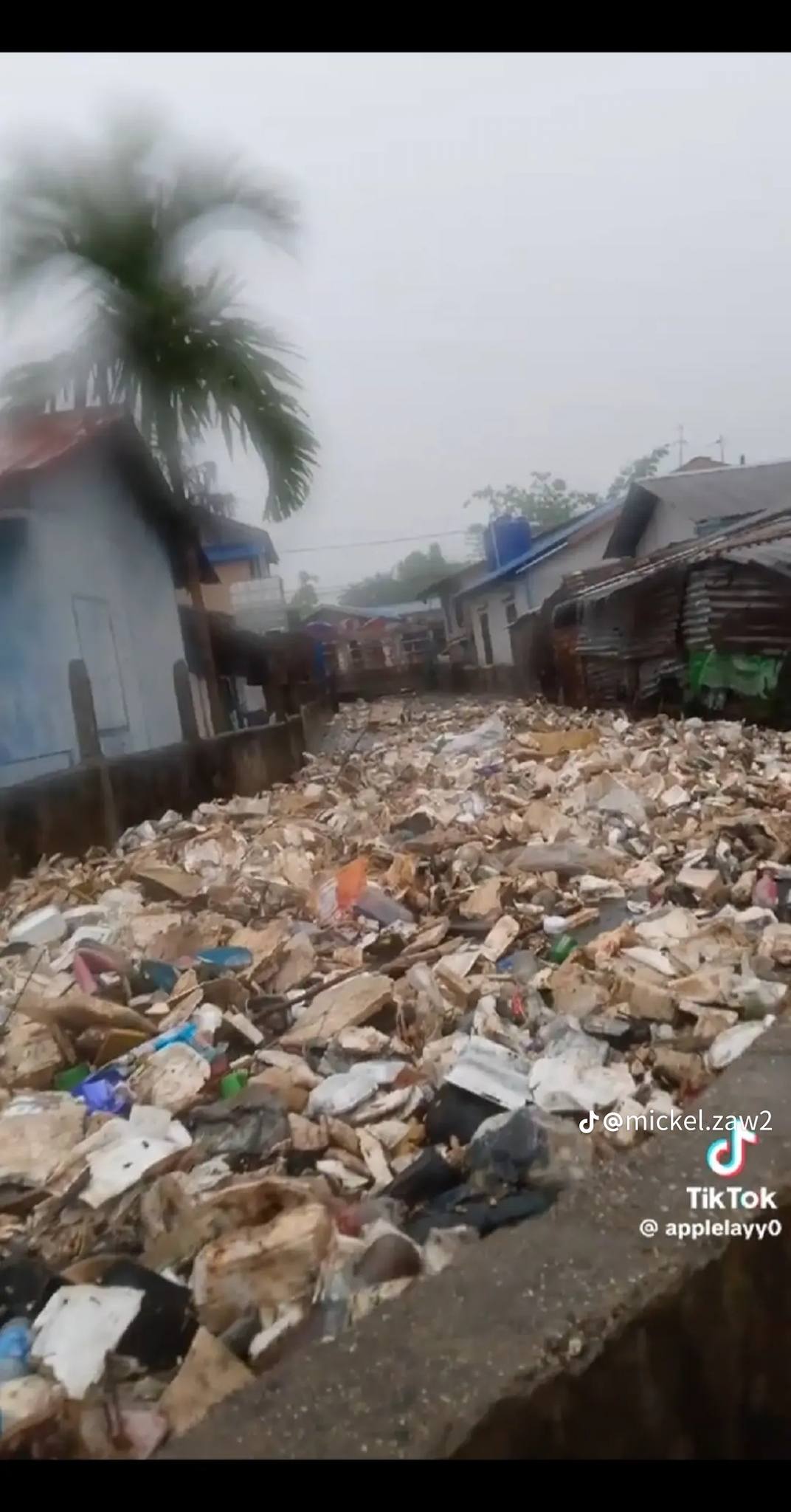 Waste blockage in drain in Mingaladon Township, Myanmar, second cleanup operation conducted