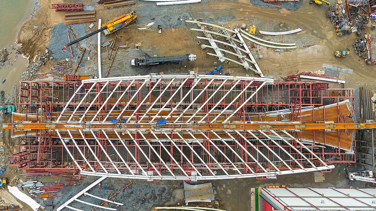 Coconut Leaf-Shaped Pedestrian Bridge Over Saigon River Nears Completion in HCMC
