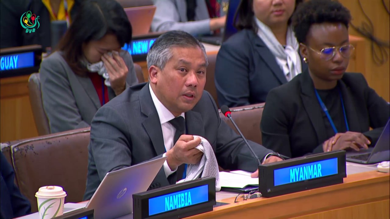 Myanmar Ambassador holds up scarf bearing victims’ names in tearful address at UN