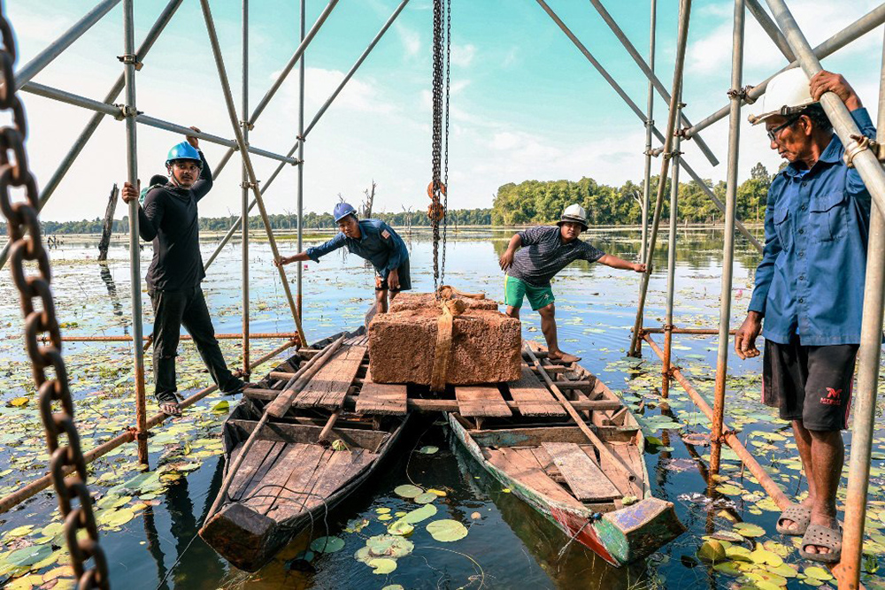 Angkor's Neak Poan Temple West Staircase Restoration Underway Using Traditional Stone Transport