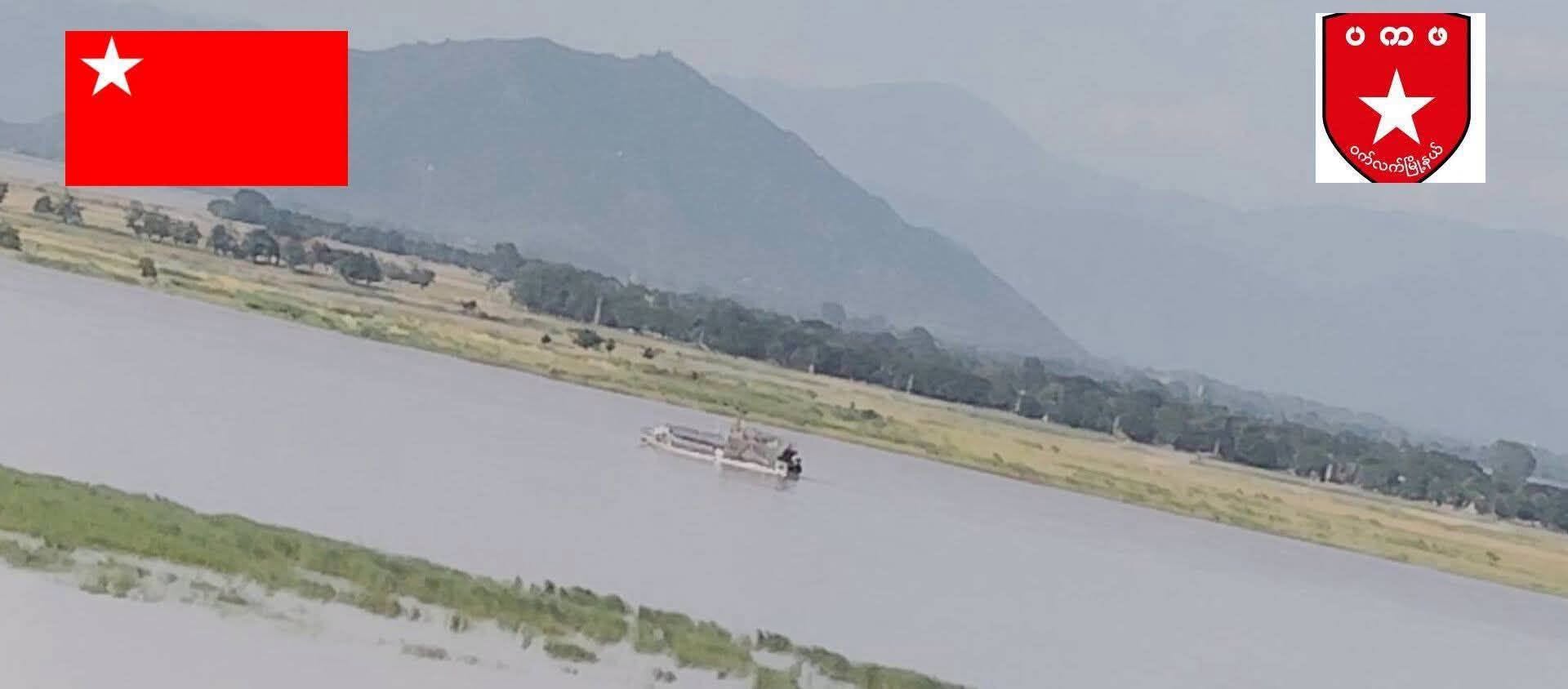 Military vessel group sails upriver in Matarra Township, burning down villages