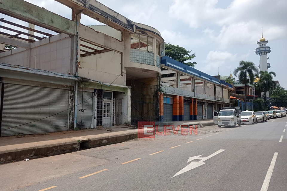 Shop buildings around Aung San Stadium in Yangon being demolished