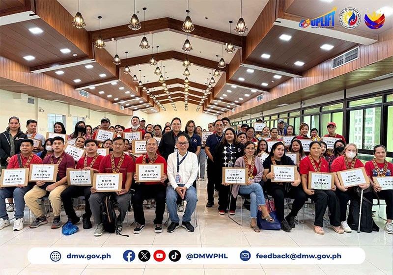 DMW Provides P2.6 Million Aid to 52 Distressed OFWs